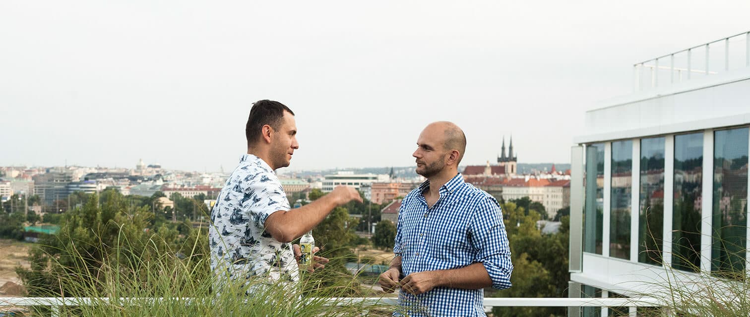 men on roof talking